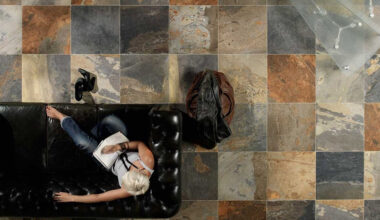 flooring face off choosing between natural stone and ceramic tile for real world spaces